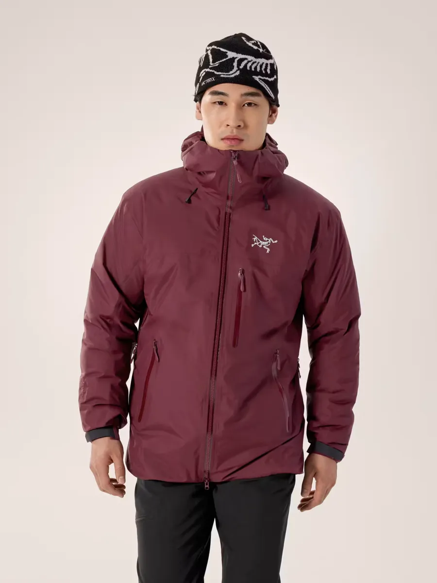 Man wearing the Arc'teryx Beta Insulated Jacket in Mars, front view